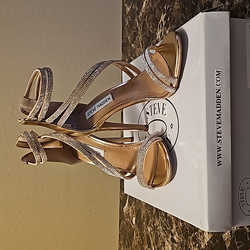Steve Madden brand new Rose Gold Size 6, open toe, rhinestone strap high heels.